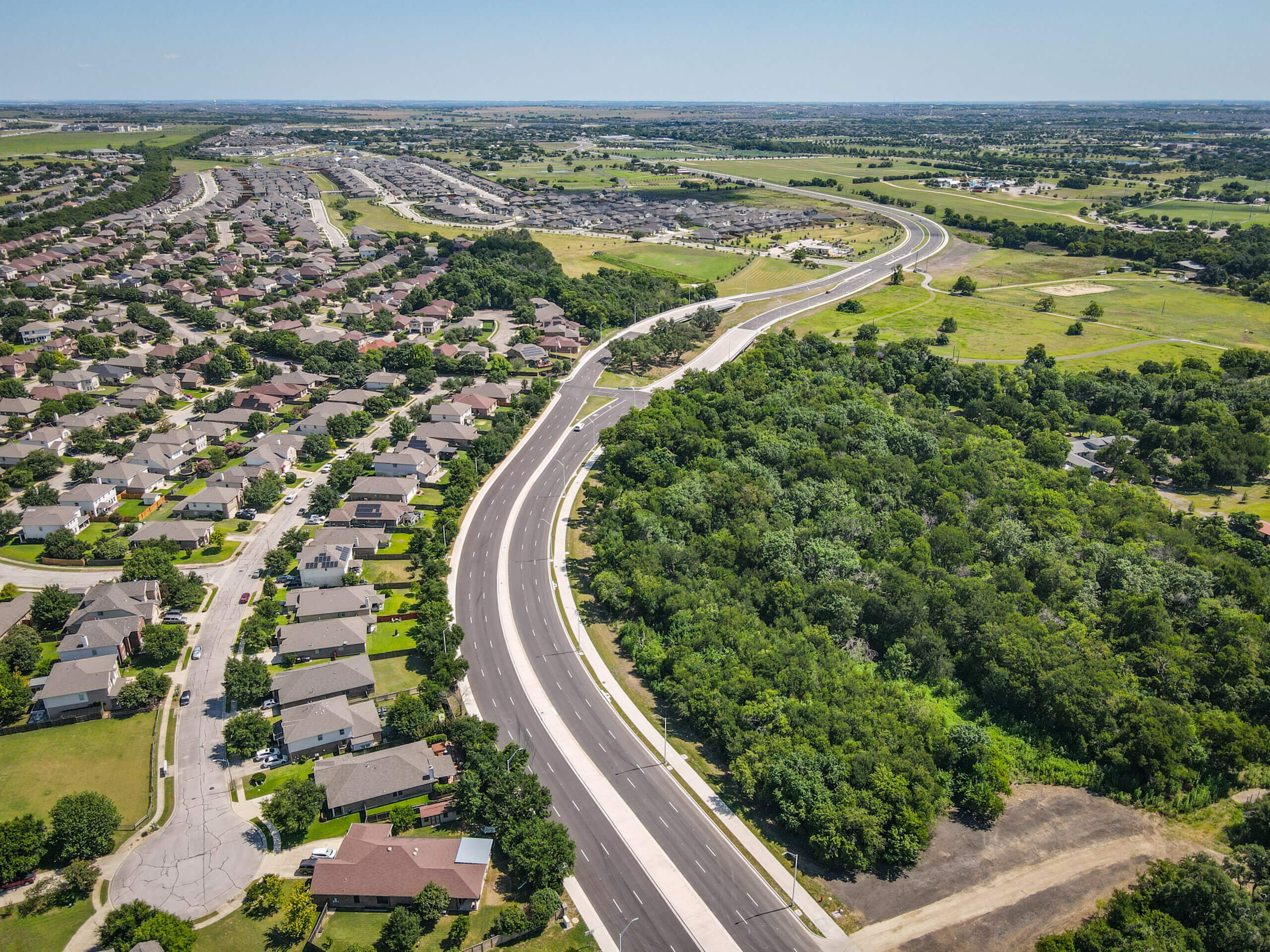 Round Rock has opened a new section of Kenney Fort Boulevard – and there’s an AI song about it