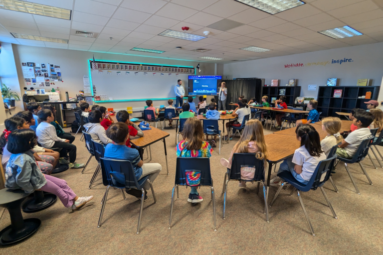 Planning staff making a presentation to an elementary school class